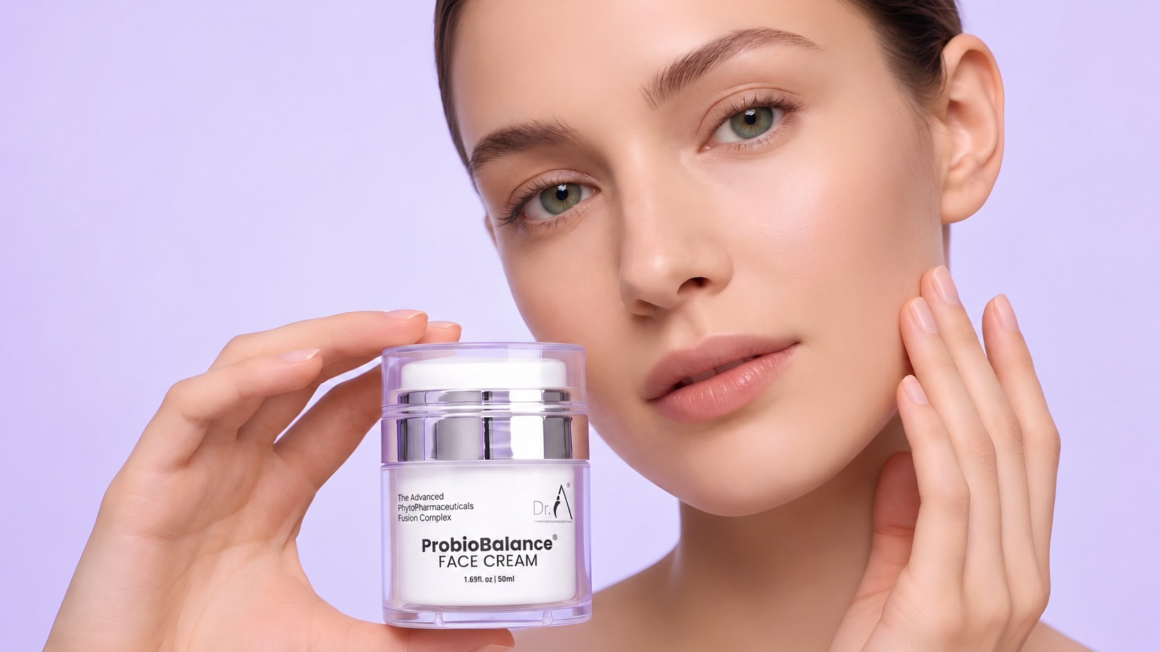 A woman holding Dr. A® ProbioBalance® Face Cream